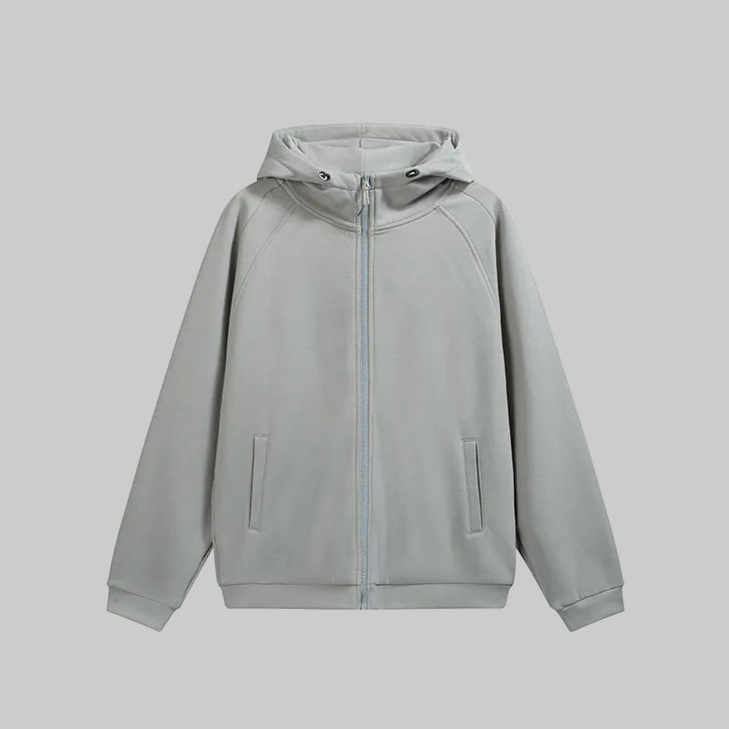 Hooded hardshell jacket in light gray with full-zip front and two side pockets.