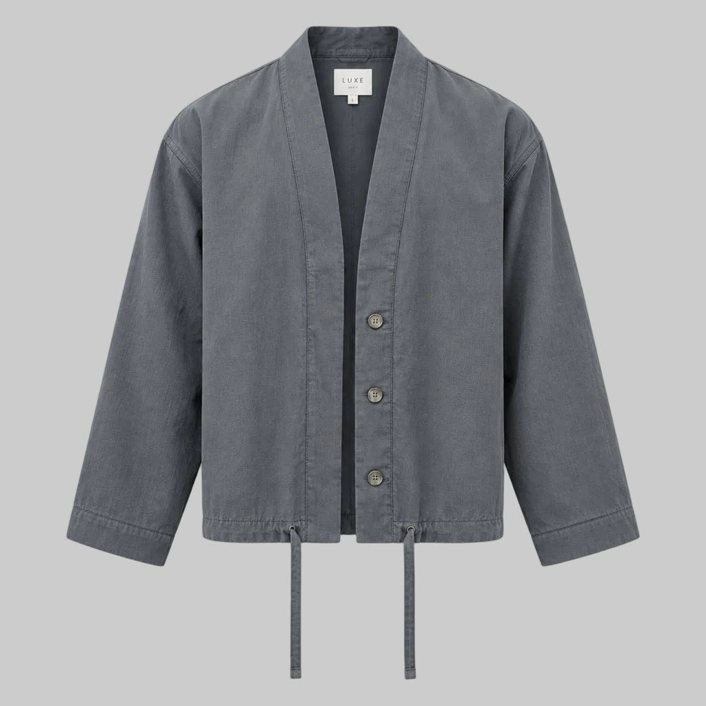 Charcoal relaxed utility jacket with button front, stand collar, drawstring hem