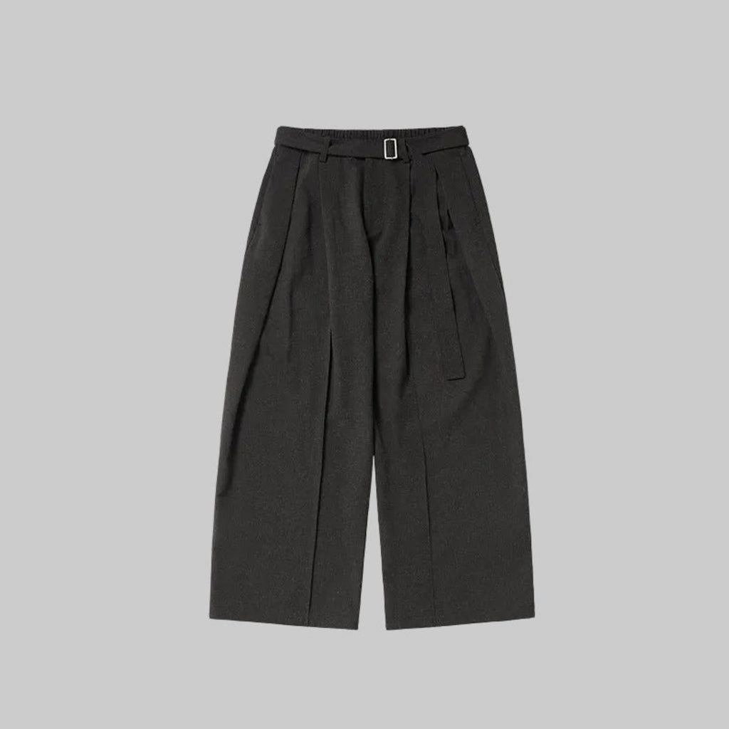 Charcoal relaxed wide-leg trousers with belt buckle, pleats, and side tie