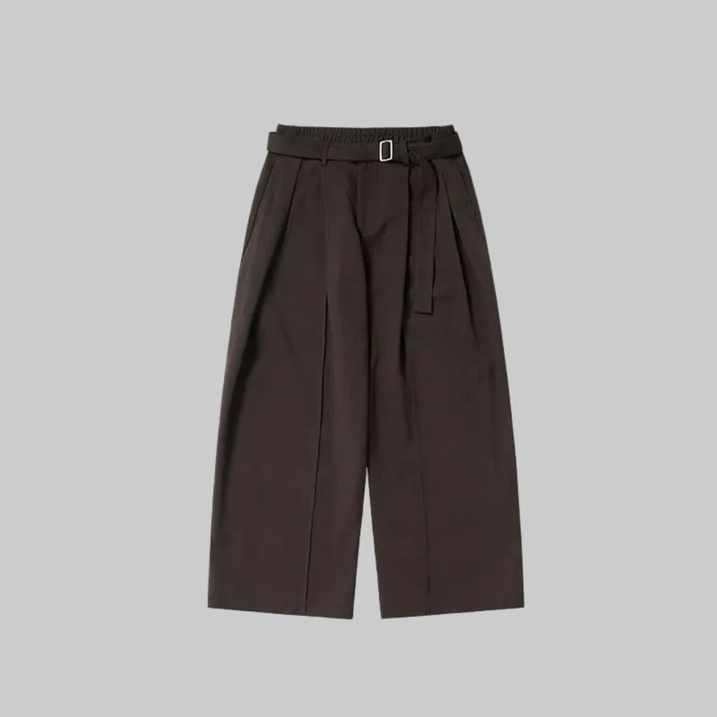 Walnut relaxed wide-leg trousers with belt buckle, pleats, and side tie