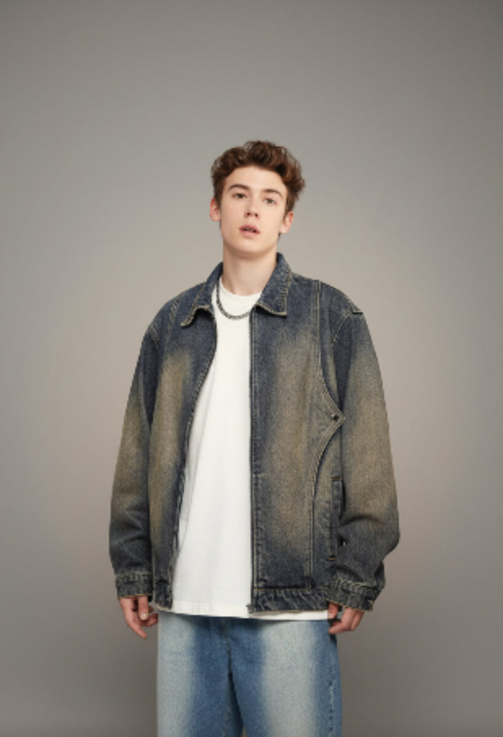 Dark-wash vintage denim jacket with zip front and oversized chest pockets