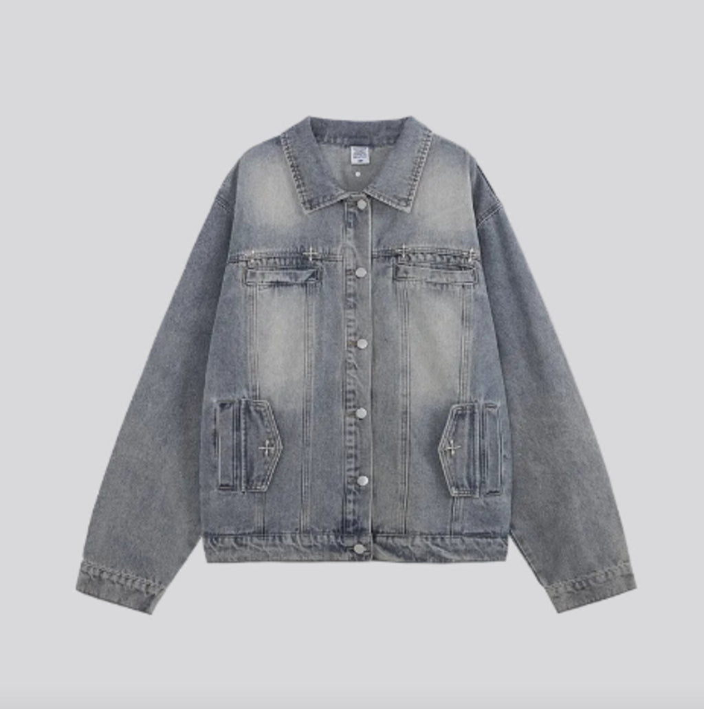 Light-wash denim jacket with button front, point collar, and two chest pockets