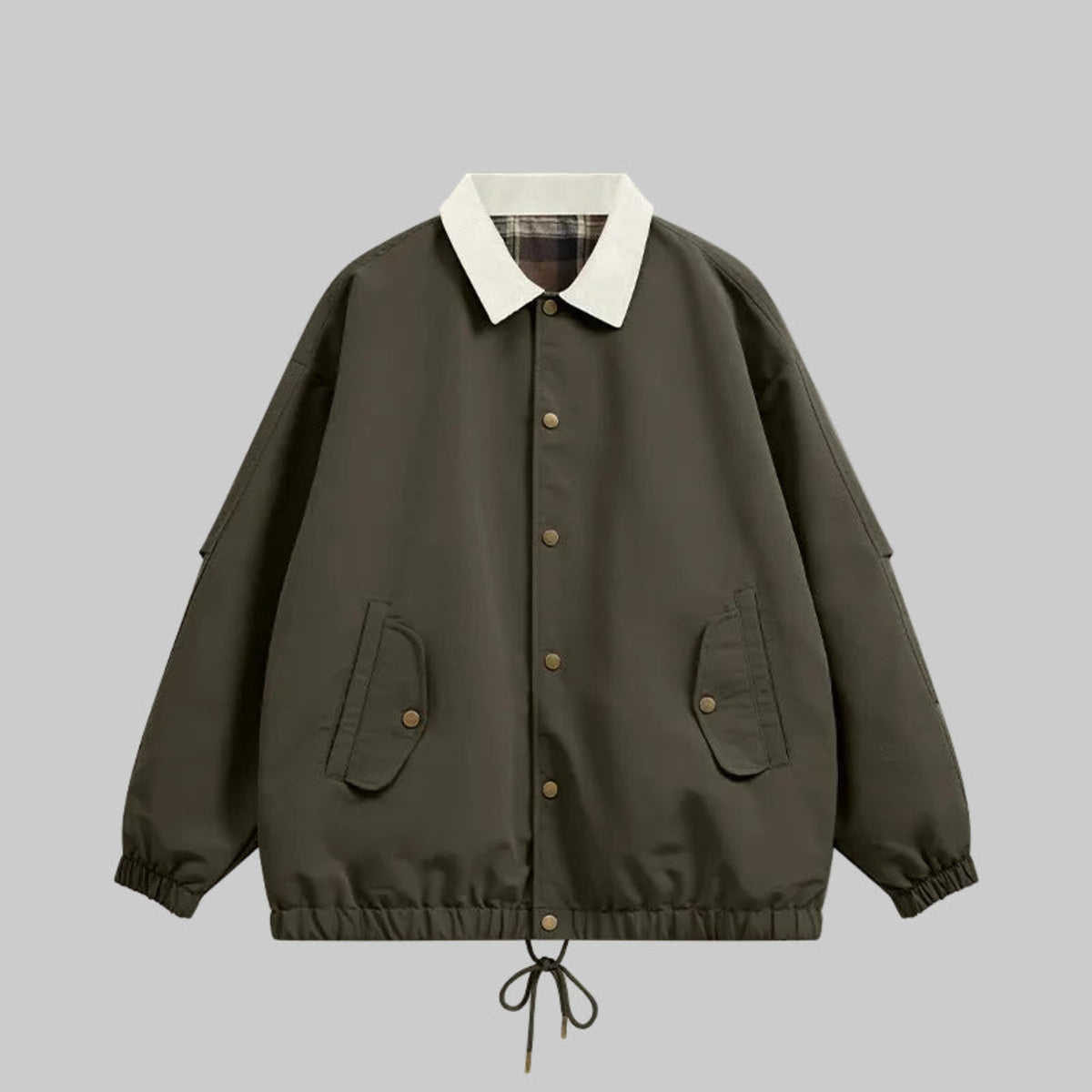 Dark utility jacket with plaid collar, button front, chest pockets, drawstring hem