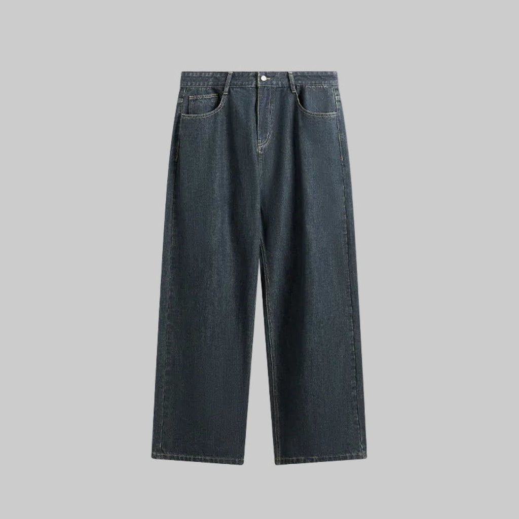 Washed straight-leg dark denim jeans with front pockets and stitched back yoke